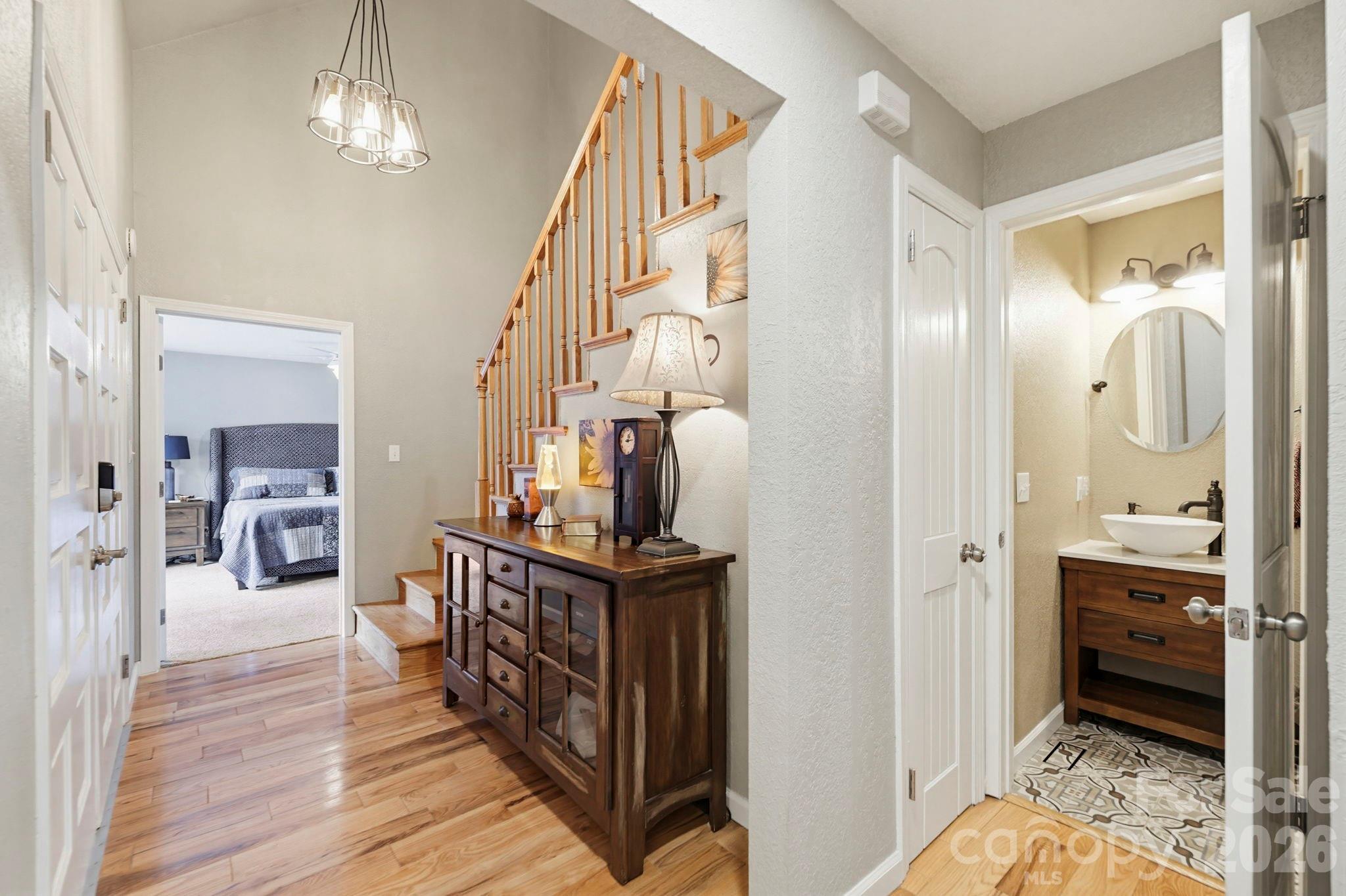 27 Spring Hill Circle Arden, NC 28704 - Photo 5 of 47 a view of a livingroom with furniture and hardwood floor