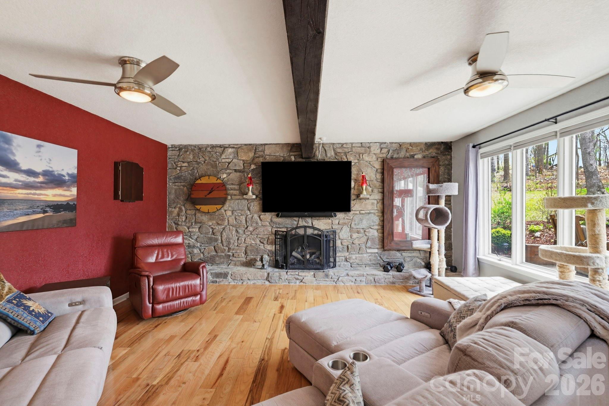 27 Spring Hill Circle Arden, NC 28704 - Photo 6 of 47 a living room with fireplace furniture and a flat screen tv
