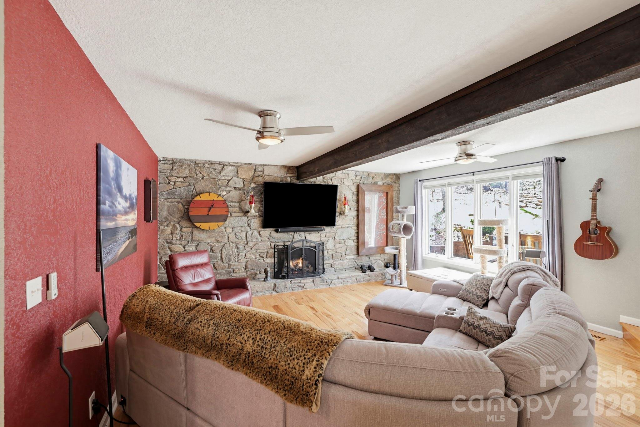 27 Spring Hill Circle Arden, NC 28704 - Photo 8 of 47 a living room with furniture and a flat screen tv