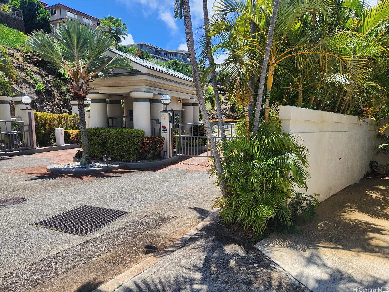 5442 Poola Street Honolulu, HI 96821 - Photo 2 of 13 a front view of a house with a yard