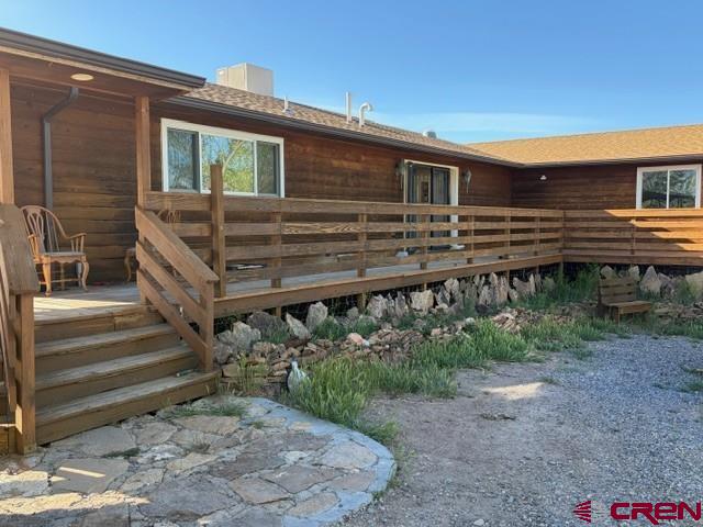 51233 Carnation Road Delta, CO 81416 - Photo 4 of 21 a house view with a backyard space