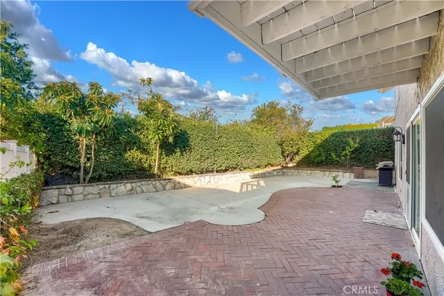 a front view of a house with a yard and outdoor space