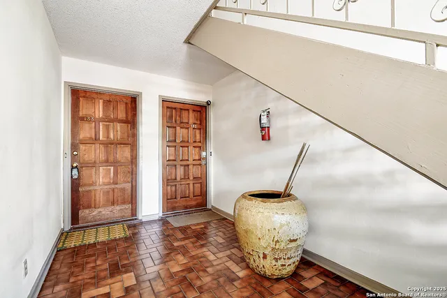 a vase of flowers sitting on a table