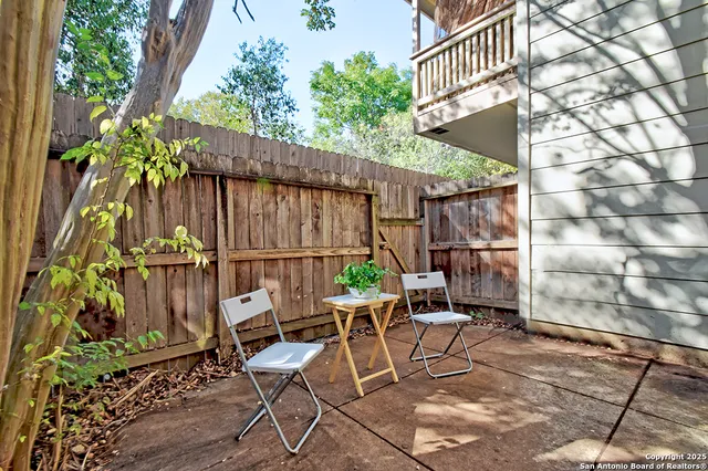 a view of yard with patio