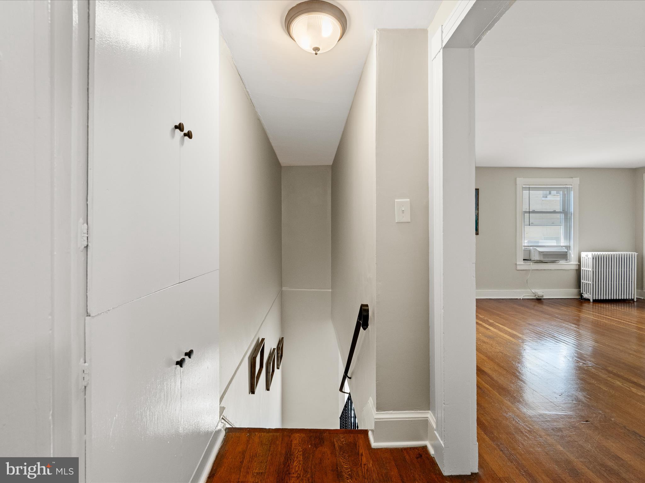 321 North Braddock Street Winchester, VA 22601 - Photo 14 of 23 a view of a room with wooden floor and windows