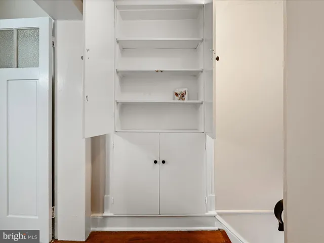 a view of a closet with shelf