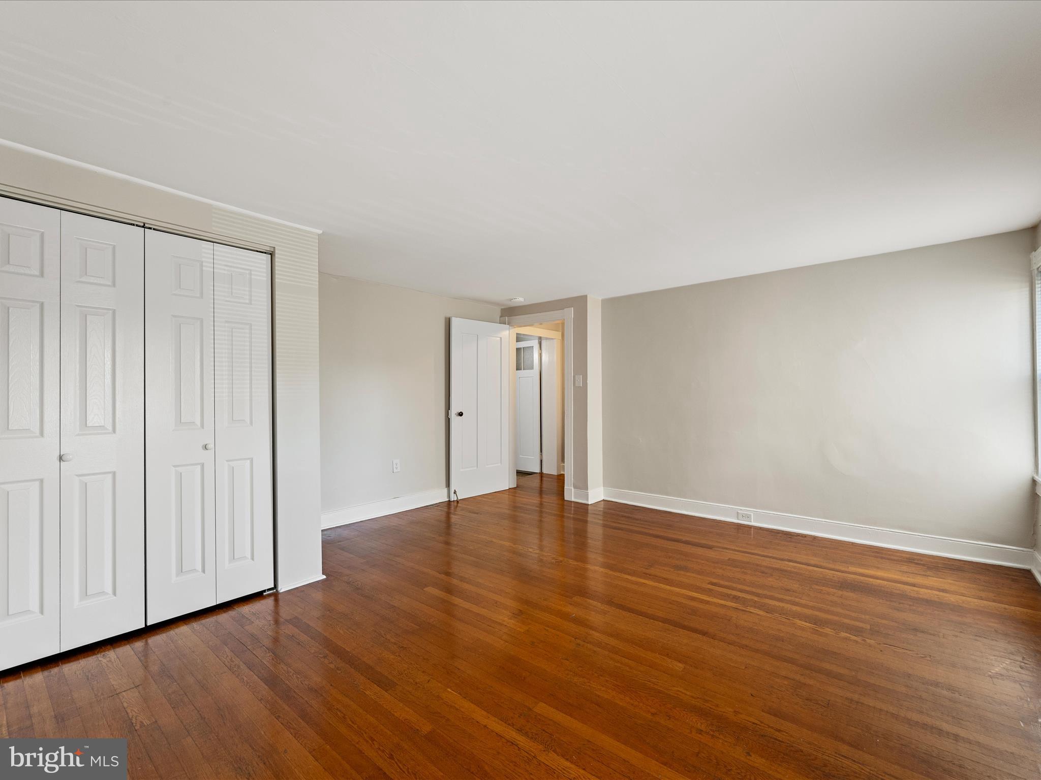 321 North Braddock Street Winchester, VA 22601 - Photo 19 of 23 a view of an empty room with wooden floor and entryway