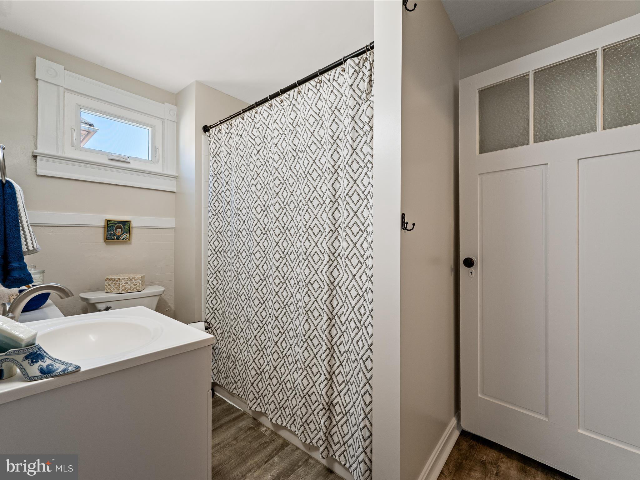 321 North Braddock Street Winchester, VA 22601 - Photo 20 of 23 a bathroom with a sink and a mirror