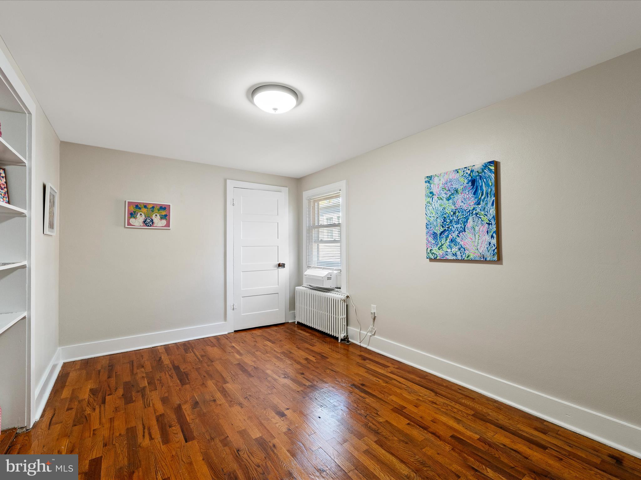 321 North Braddock Street Winchester, VA 22601 - Photo 22 of 23 a view of empty room with wooden floor