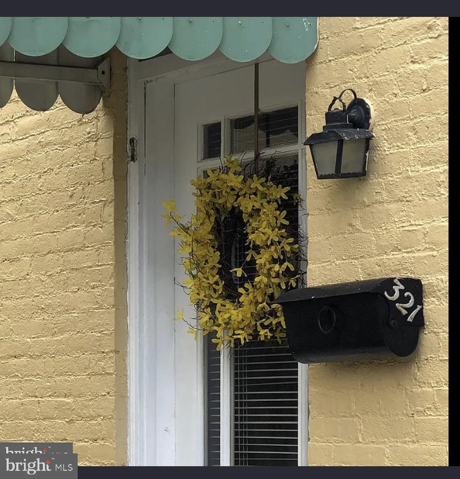 321 North Braddock Street Winchester, VA 22601 - Photo 23 of 23 a vase of flowers sitting on a table