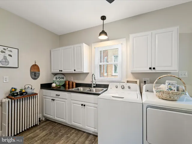 a kitchen that has a cabinets and a stove