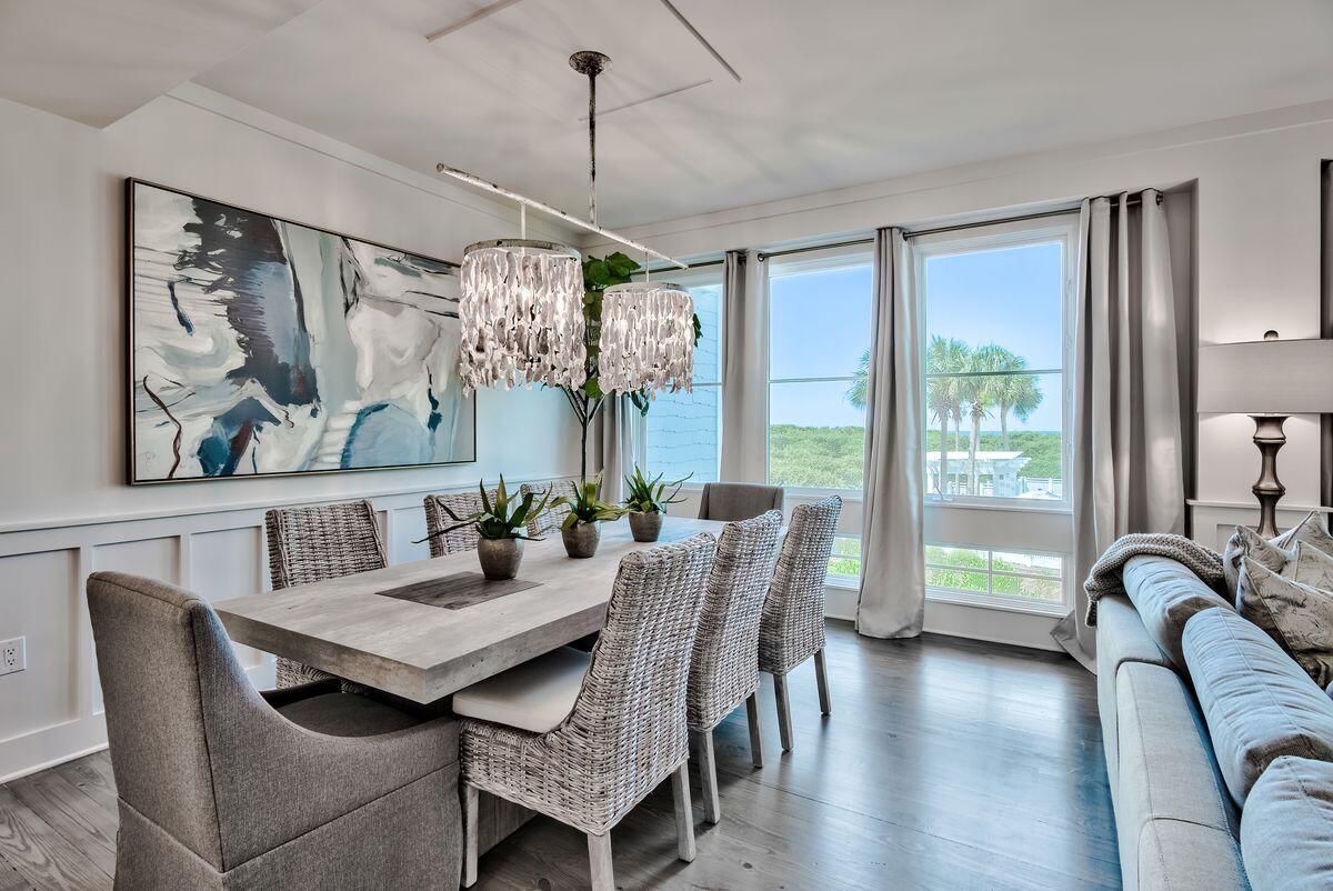 337 Bridge Lane, Unit 102B Inlet Beach, FL 32461 - Photo 20 of 50 a view of a dining room with furniture window and wooden floor