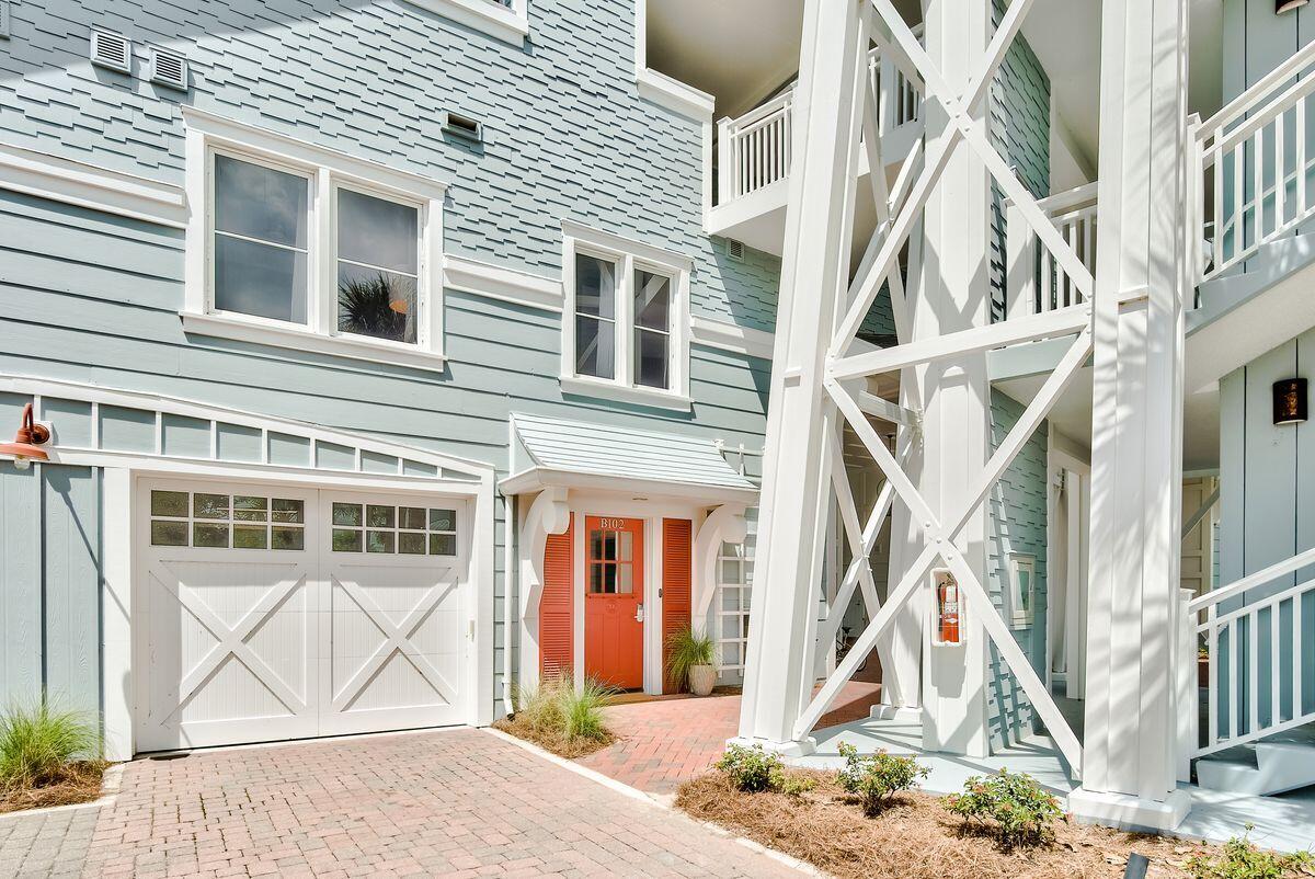337 Bridge Lane, Unit 102B Inlet Beach, FL 32461 - Photo 2 of 50 a front view of a house with a yard