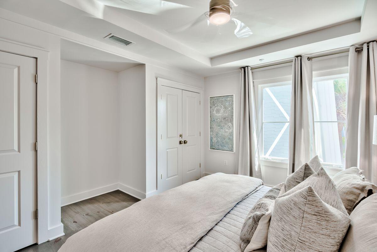 337 Bridge Lane, Unit 102B Inlet Beach, FL 32461 - Photo 25 of 50 a bedroom with a bed and a window