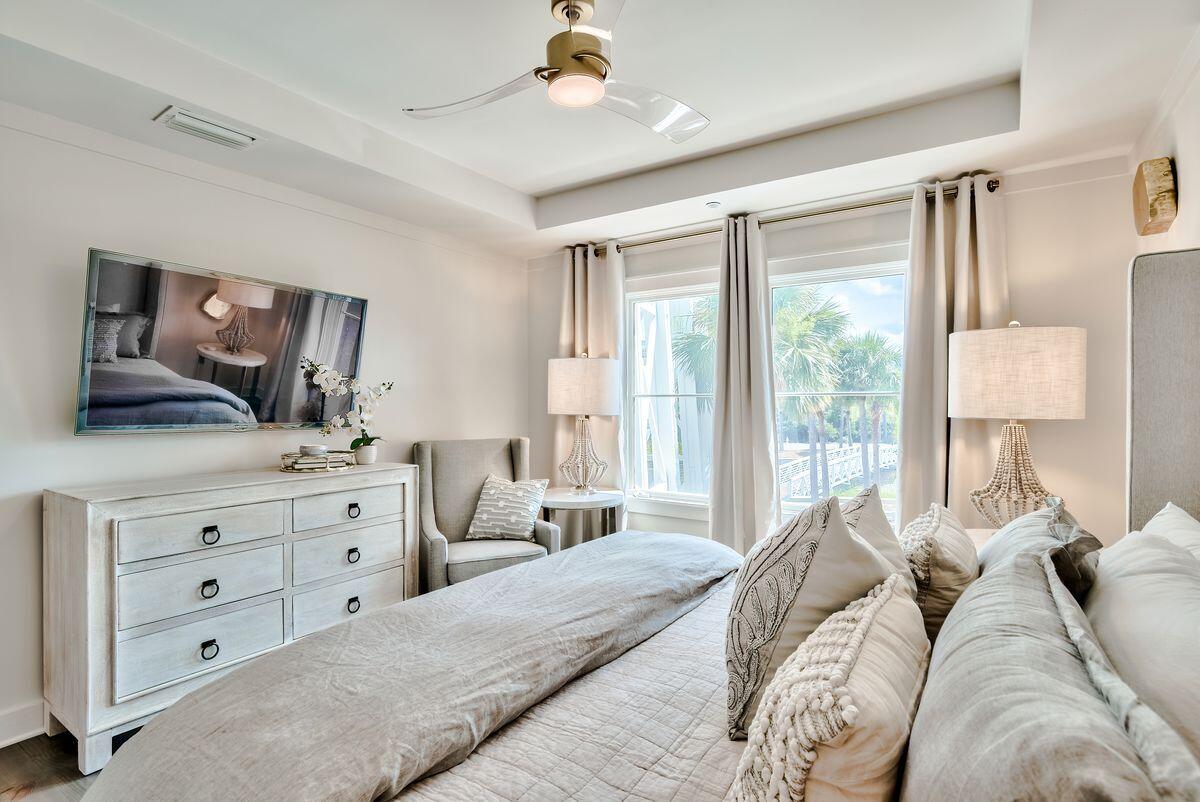 337 Bridge Lane, Unit 102B Inlet Beach, FL 32461 - Photo 28 of 50 a bedroom with a large bed and a window