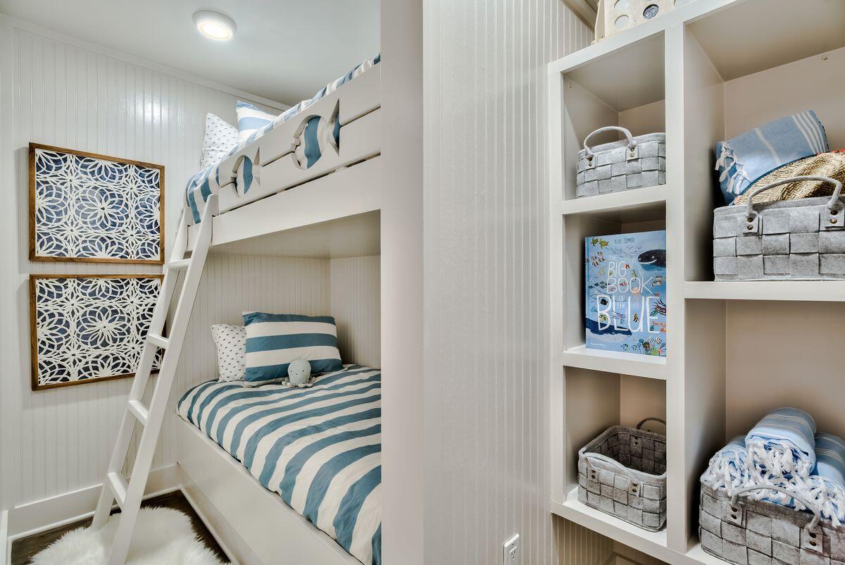337 Bridge Lane, Unit 102B Inlet Beach, FL 32461 - Photo 31 of 50 a bedroom with a bed and wall painting