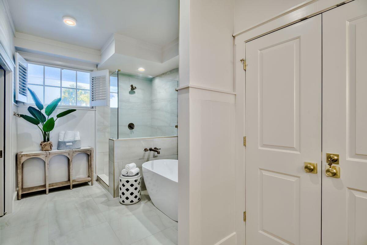 337 Bridge Lane, Unit 102B Inlet Beach, FL 32461 - Photo 36 of 50 a bathroom with sink and mirror