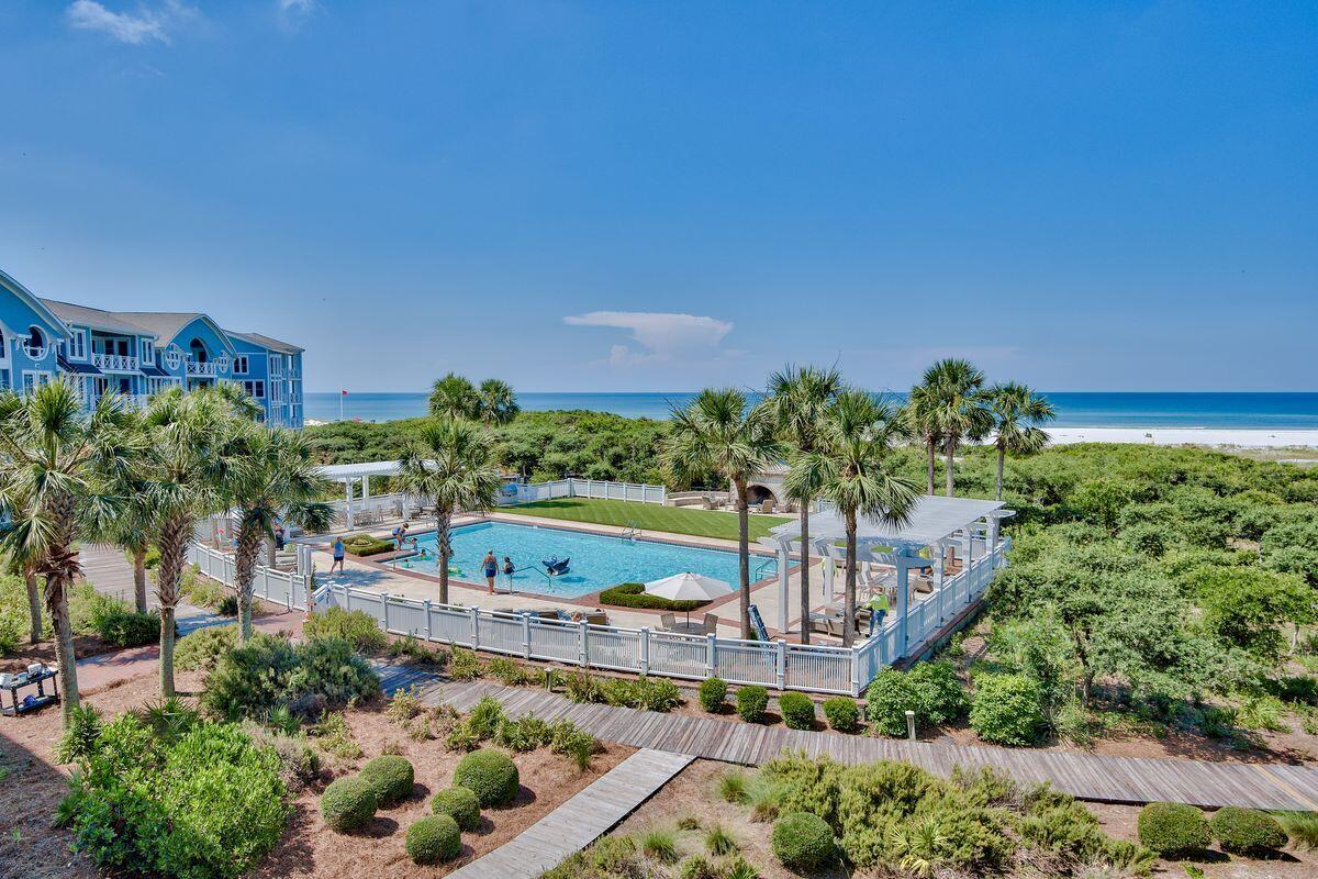 337 Bridge Lane, Unit 102B Inlet Beach, FL 32461 - Photo 42 of 50 a view of a garden with a building in the background