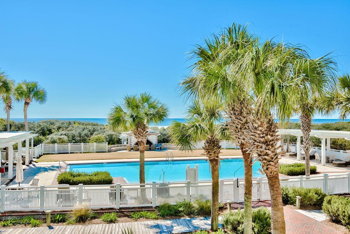 337 Bridge Lane, Unit 102B Inlet Beach, FL 32461 - Photo 44 of 50 a view of outdoor space with swimming pool and trees
