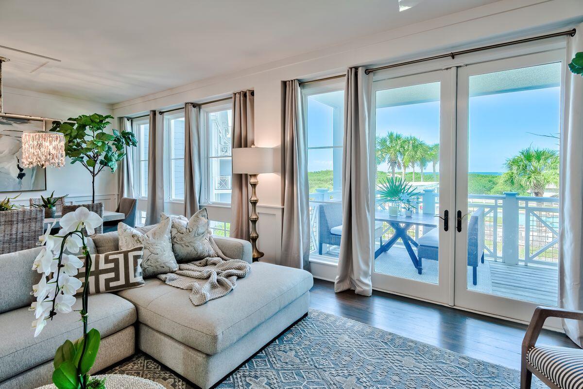 337 Bridge Lane, Unit 102B Inlet Beach, FL 32461 - Photo 5 of 50 a living room with furniture and a large window