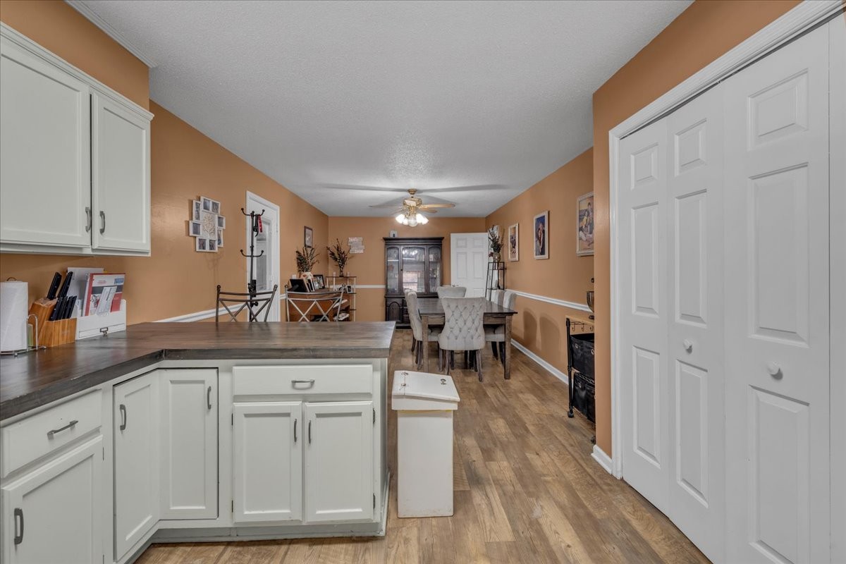202 Mortons Lake Road Manchester, TN 37355 - Photo 22 of 41 a kitchen with white cabinets and sink