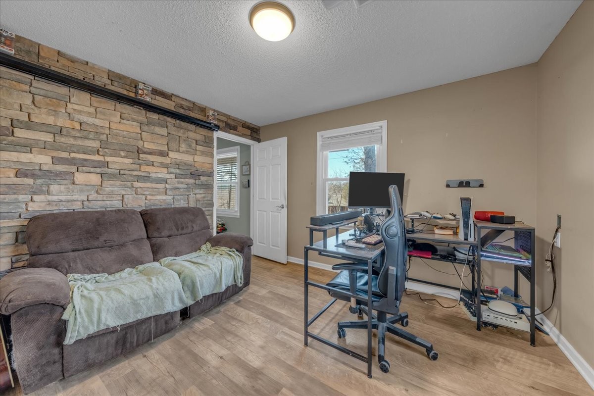 202 Mortons Lake Road Manchester, TN 37355 - Photo 23 of 41 a living room with furniture and a flat screen tv