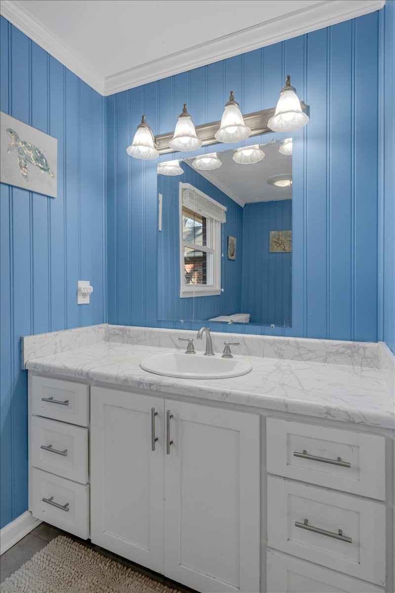 202 Mortons Lake Road Manchester, TN 37355 - Photo 29 of 41 a bathroom with a sink vanity and a mirror