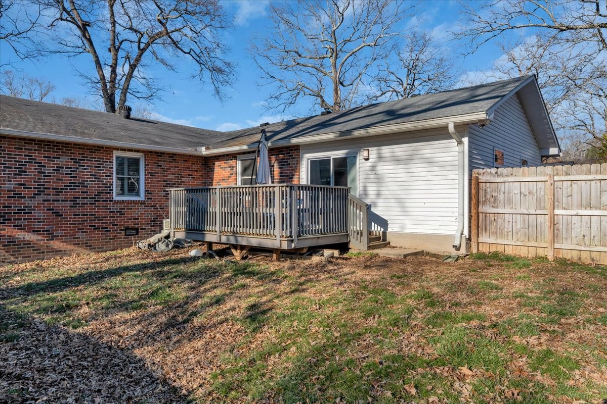 202 Mortons Lake Road Manchester, TN 37355 - Photo 37 of 41 a backyard of house with large trees and a barn