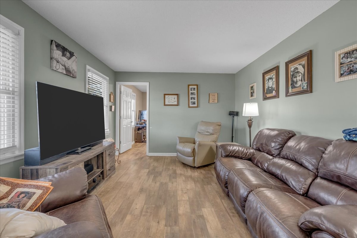 202 Mortons Lake Road Manchester, TN 37355 - Photo 9 of 41 a living room with furniture and a flat screen tv