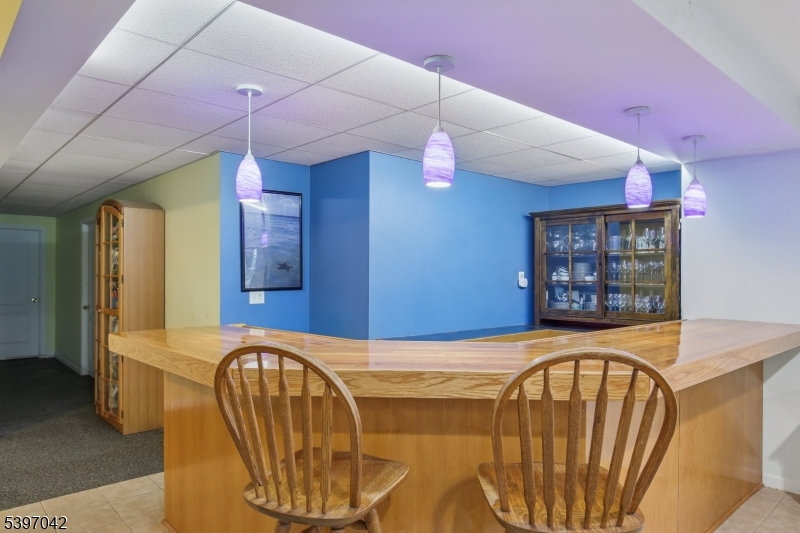 154 Lott Road Wantage, NJ 07461 - Photo 29 of 39 a view of a livingroom with furniture and staircase