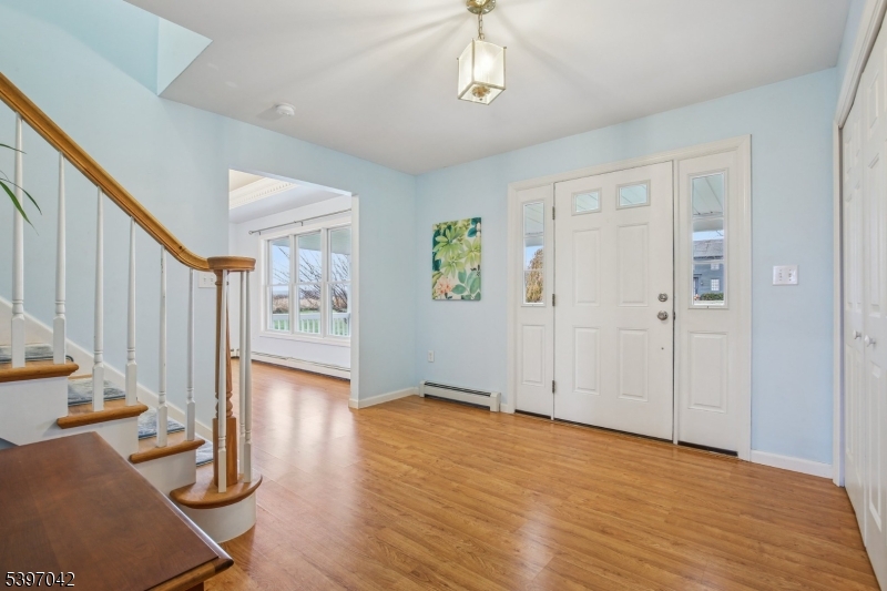 154 Lott Road Wantage, NJ 07461 - Photo 3 of 39 a view of an empty room with wooden floor