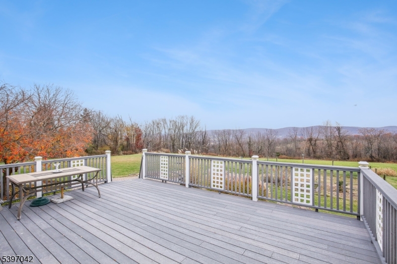 154 Lott Road Wantage, NJ 07461 - Photo 31 of 39 a view of a balcony with wooden floor and fence