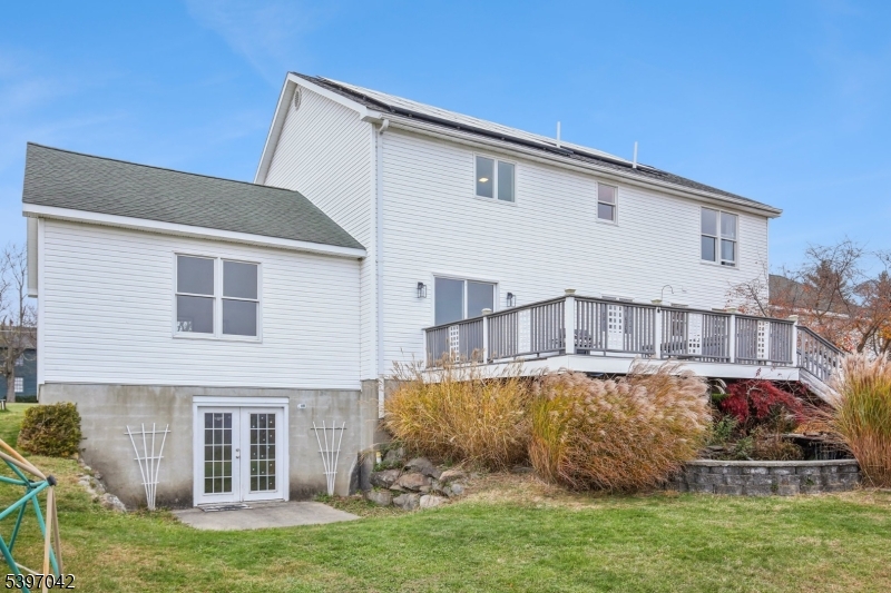 154 Lott Road Wantage, NJ 07461 - Photo 32 of 39 a front view of a house with a yard