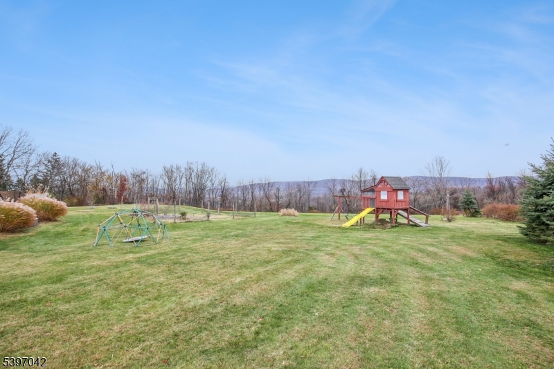 154 Lott Road Wantage, NJ 07461 - Photo 39 of 39 a backyard of a house with table and chairs