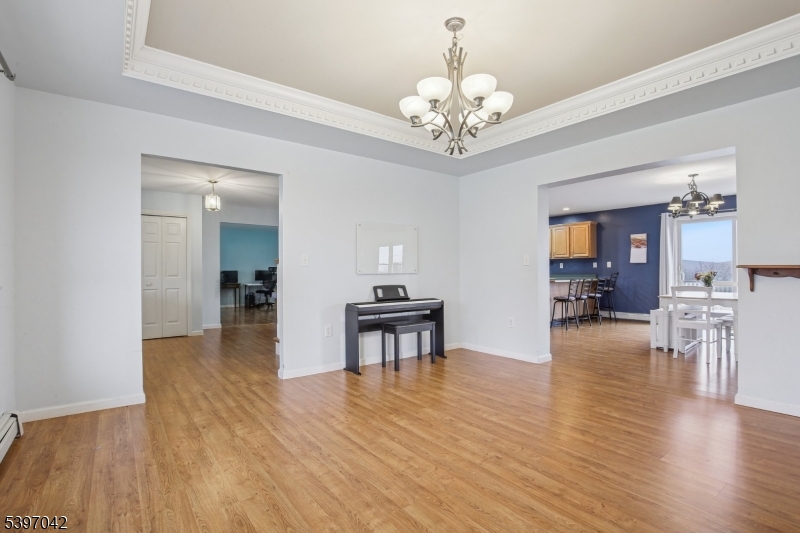 154 Lott Road Wantage, NJ 07461 - Photo 5 of 39 a view of a livingroom with kitchen and furniture