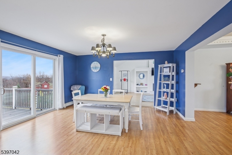154 Lott Road Wantage, NJ 07461 - Photo 8 of 39 a view of a dining room with furniture window and wooden floor