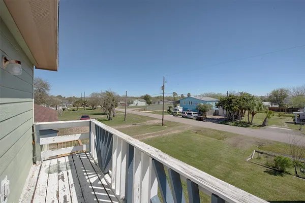 a view of a balcony with city view