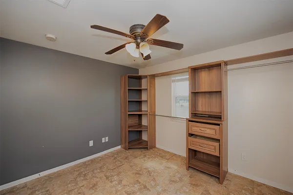 a view of room with closet and window