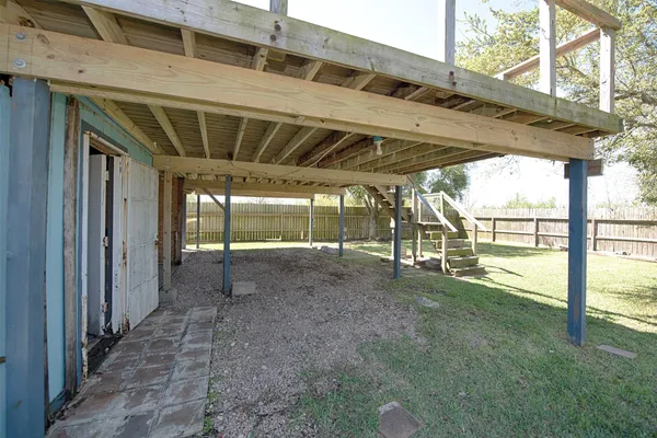 a view of an empty room with a porch