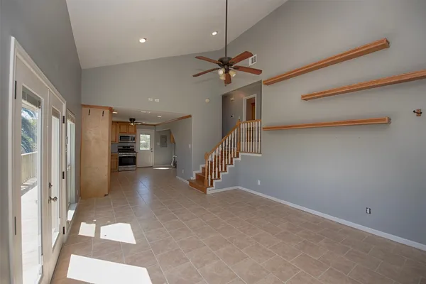 a view of a hallway with staircase