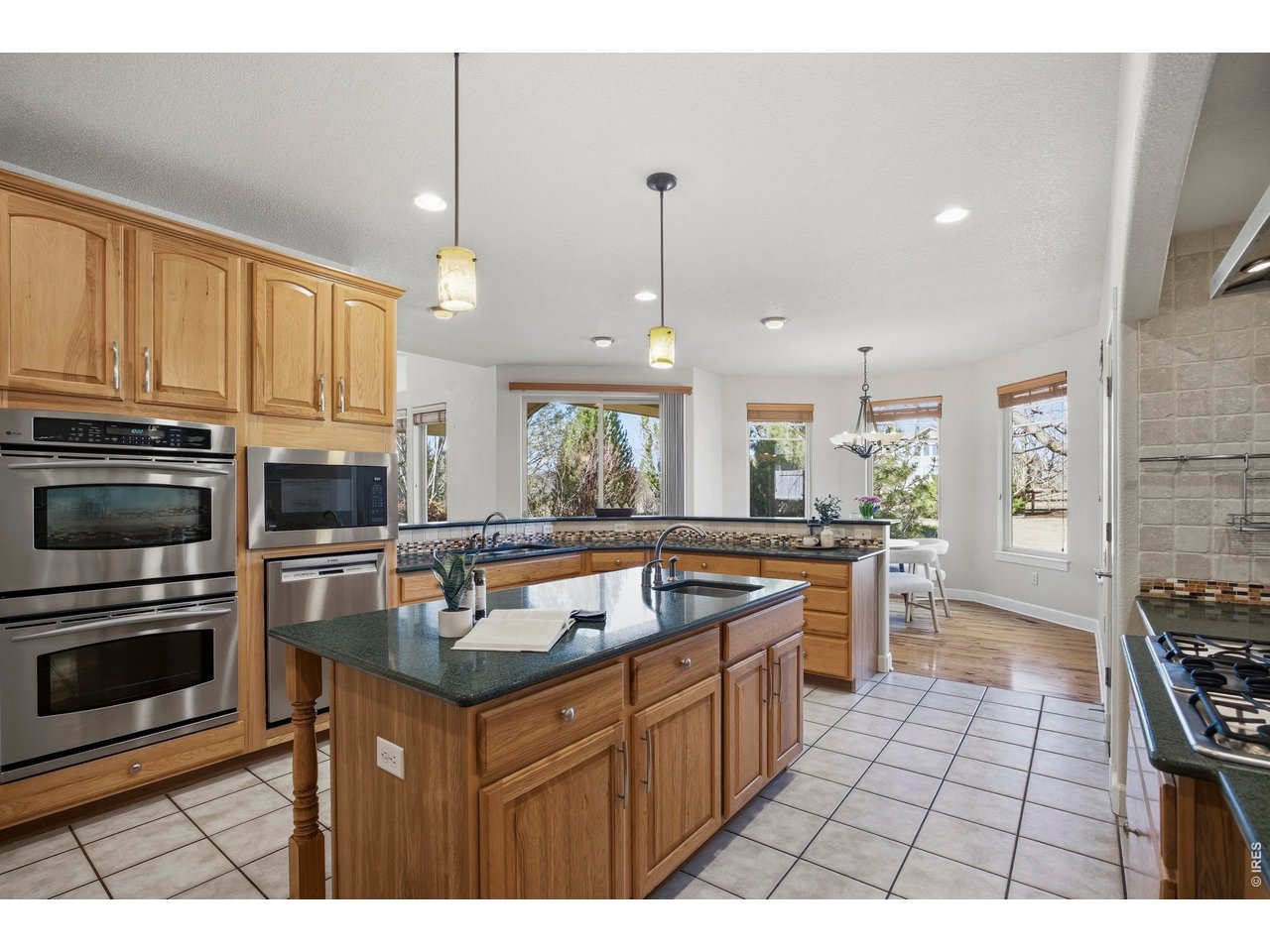 6580 Rookery Road Fort Collins, CO 80528 - Photo 11 of 44 Spacious gourmet kitchen featuring double ovens