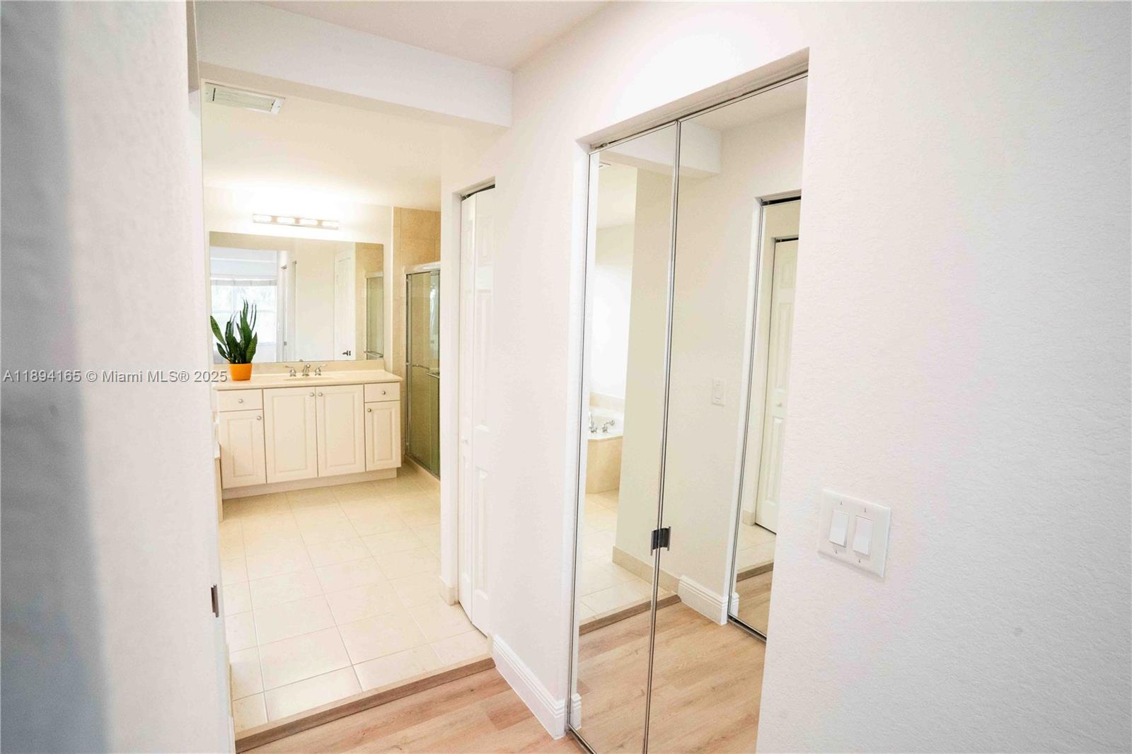 4537 Southwest 183rd Avenue Miramar, FL 33029 - Photo 13 of 46 a view of a bathroom with a tub and shower