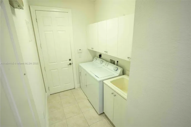 a utility room with a sink