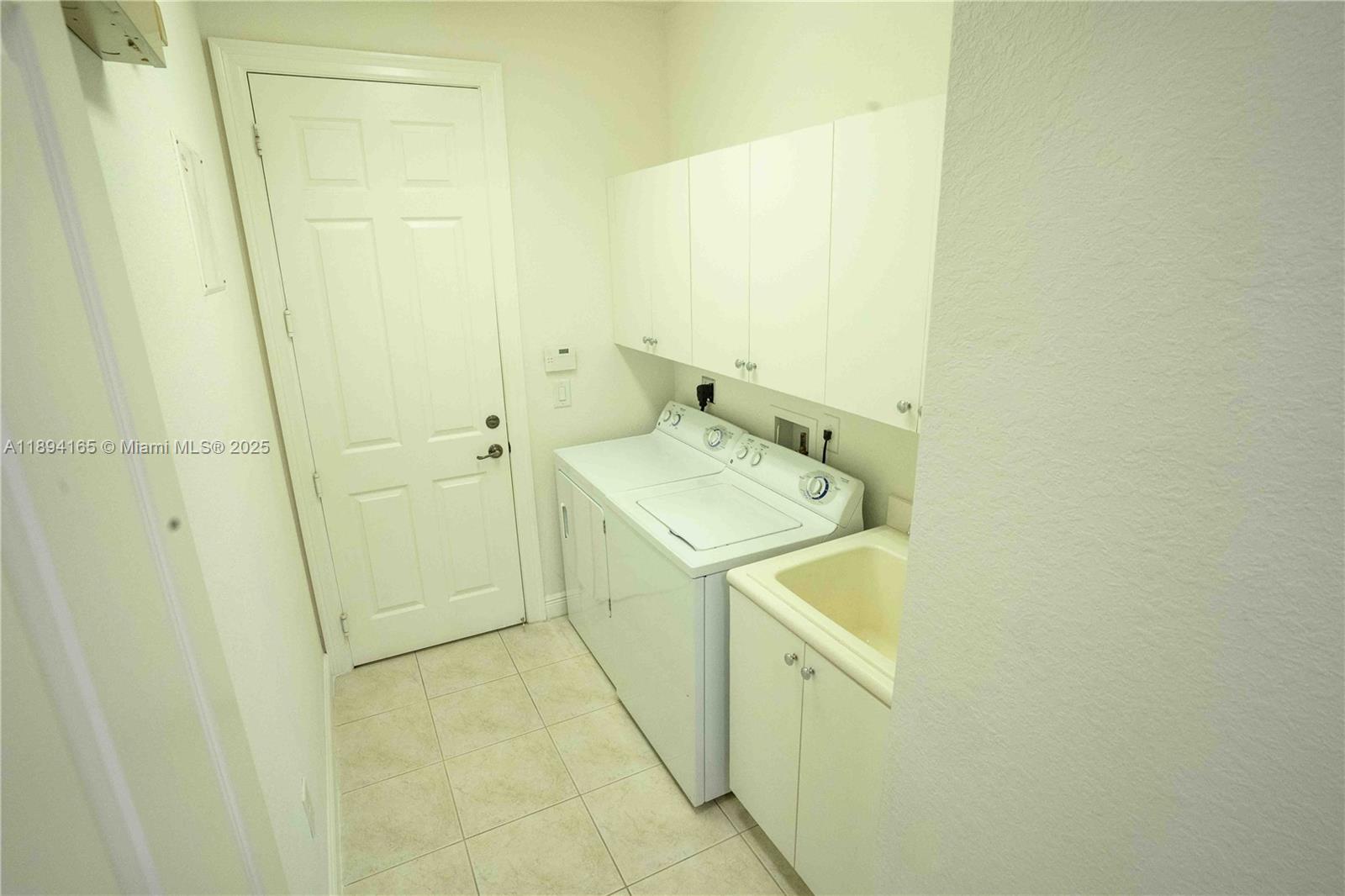 4537 Southwest 183rd Avenue Miramar, FL 33029 - Photo 26 of 46 a utility room with a sink