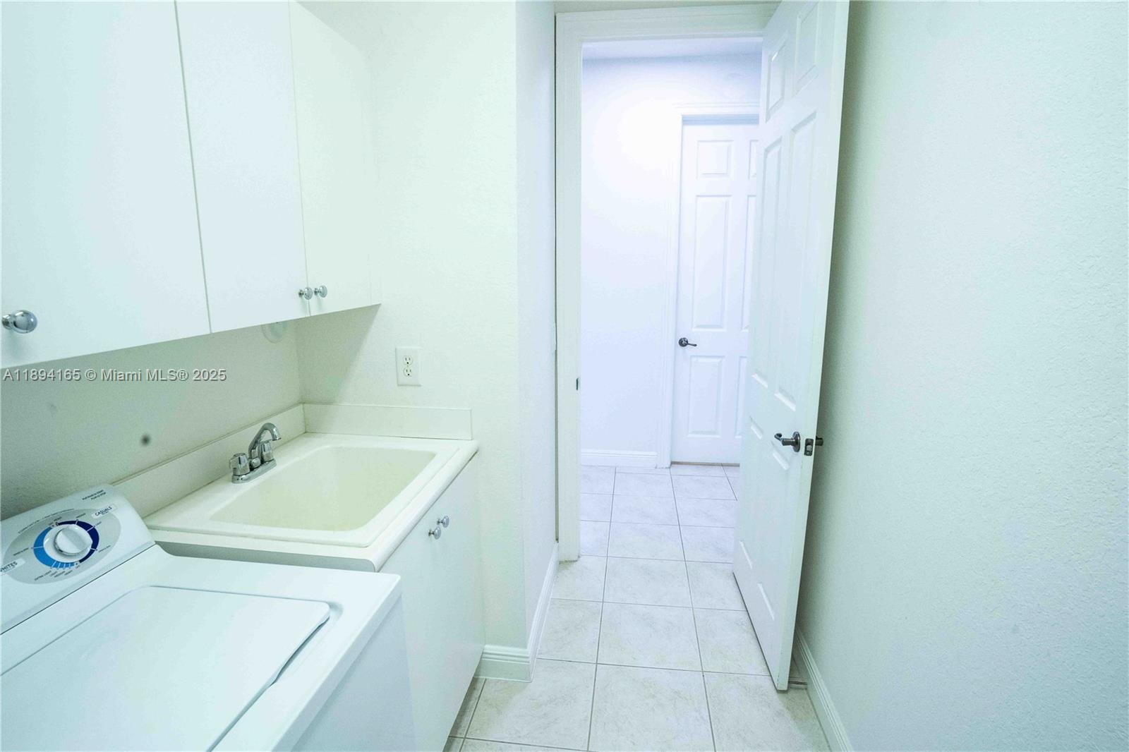 4537 Southwest 183rd Avenue Miramar, FL 33029 - Photo 27 of 46 a bathroom with a sink and a tub