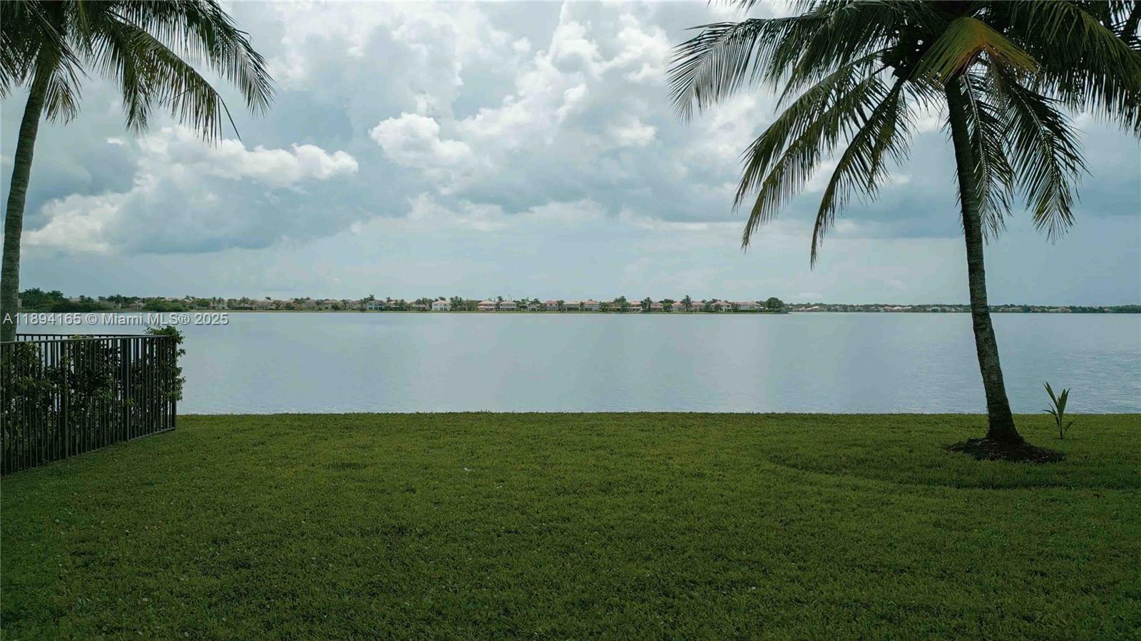 4537 Southwest 183rd Avenue Miramar, FL 33029 - Photo 29 of 46 a view of a lake with a big yard