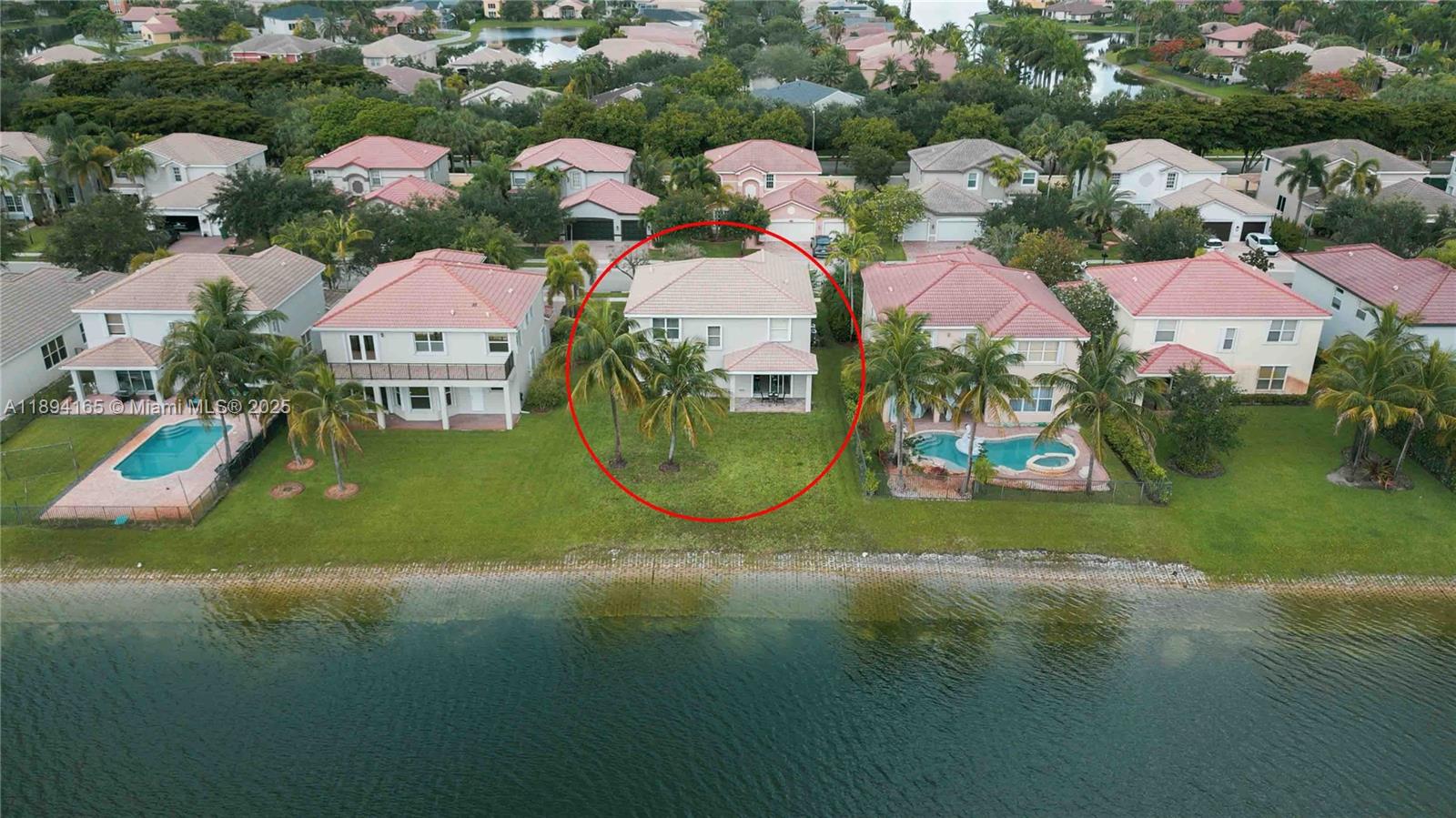 4537 Southwest 183rd Avenue Miramar, FL 33029 - Photo 35 of 46 an aerial view of residential houses with outdoor space and swimming pool