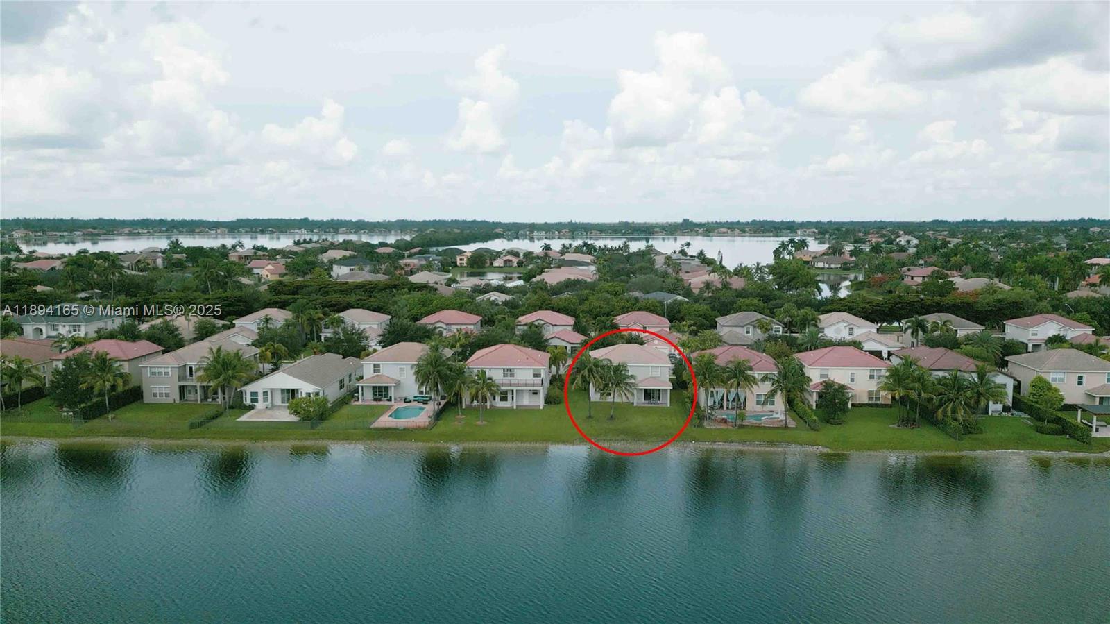 4537 Southwest 183rd Avenue Miramar, FL 33029 - Photo 36 of 46 a view of a lake with houses