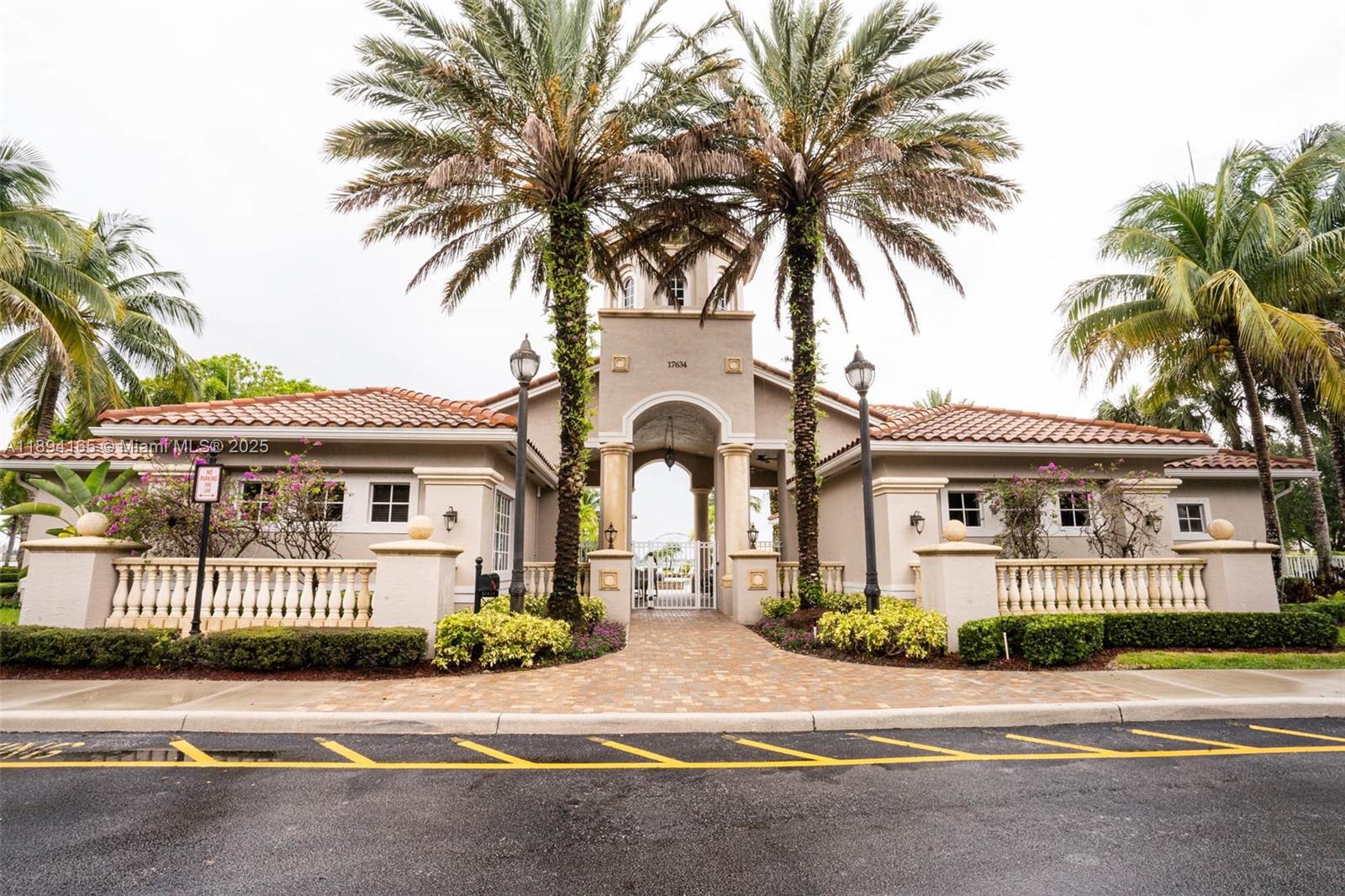 4537 Southwest 183rd Avenue Miramar, FL 33029 - Photo 40 of 46 front view of a house with a garden