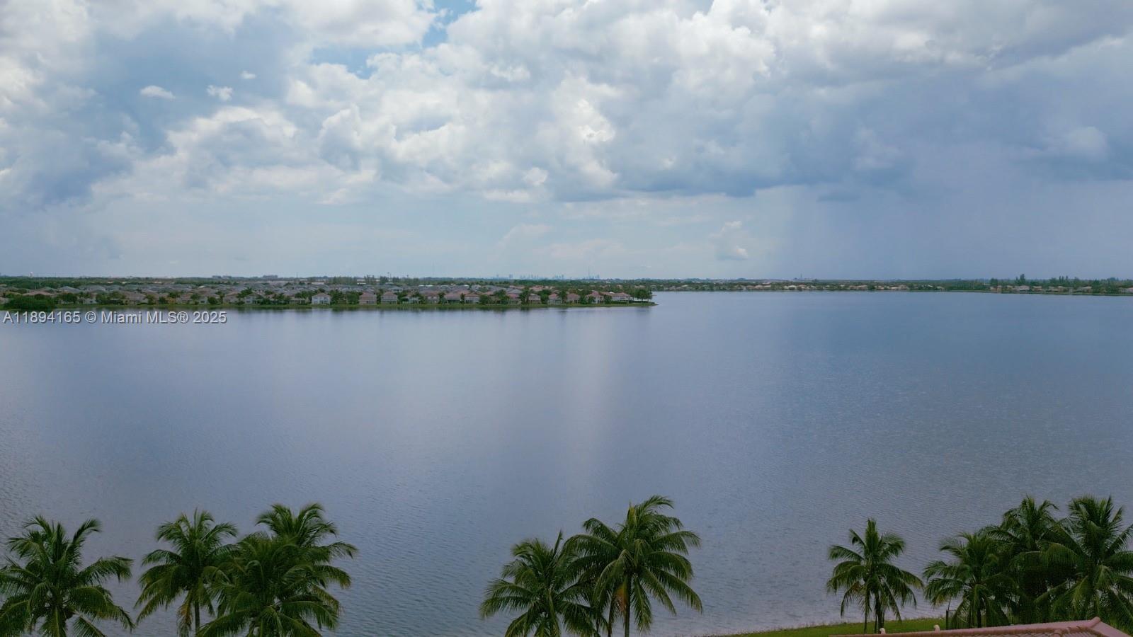 4537 Southwest 183rd Avenue Miramar, FL 33029 - Photo 41 of 46 a view of a lake with houses in the back